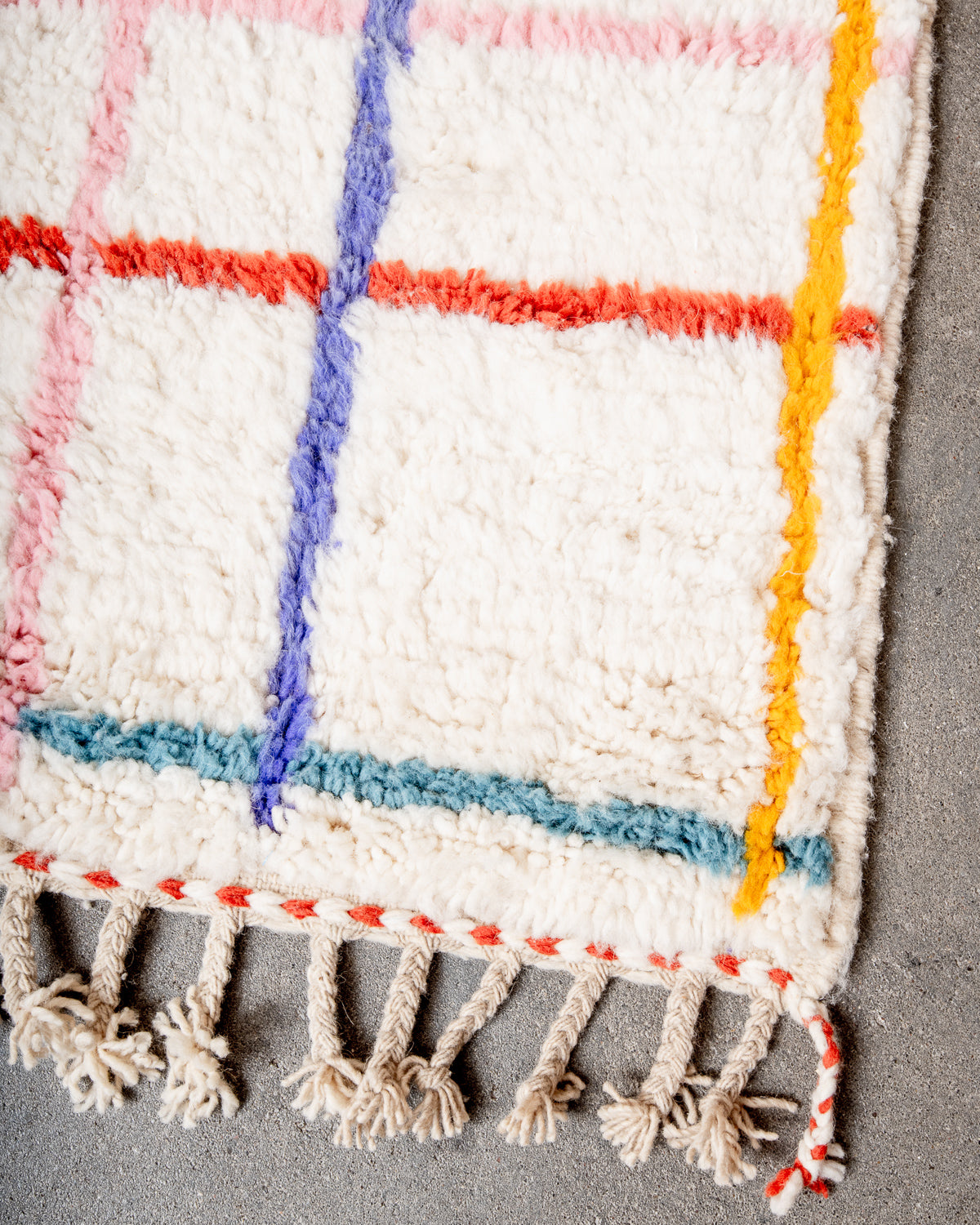 Modern, designer, handcrafted Berber rug from Morocco. Beniourain carpet with beautiful colours and patterns and fluffy wool texture.